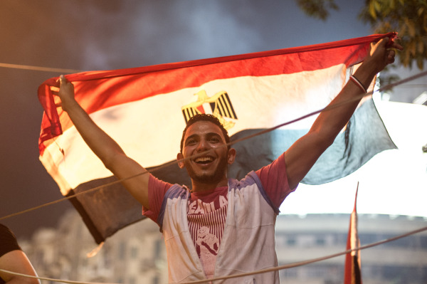 Des opposants à Mohamed Morsi célèbrent la destitution du président sur la place Tahrir au Caire, en Egypte, le 3 juillet 2013.  (Photo : Li Muzi) © Xinhua / Allpix Press 