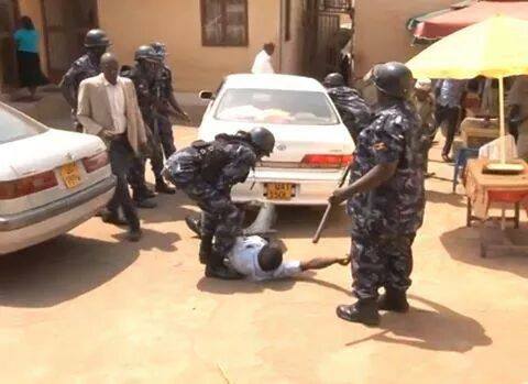 Screenshot of police beating up a journalist attached to WBS TV Uganda