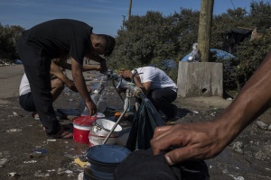 Migrants are living in a camp called "Jungle" near the ferry port in Calais, northern France. Around 3,000 migrants from Syria, Libya, Eritrea, Soudan, Iraq, Koweit, Afghanistan are camped out in a makeshift tent village in Calais waiting for a chance to cross to Britain. Calais, FRANCE 22/08/2015